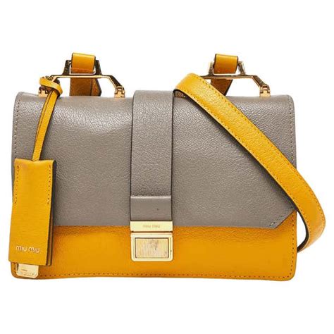 miu miu bandoliera madras crossbody bag|Miu Miu Mustard/grey Madras Leather Bandoliera Crossbody Bag.